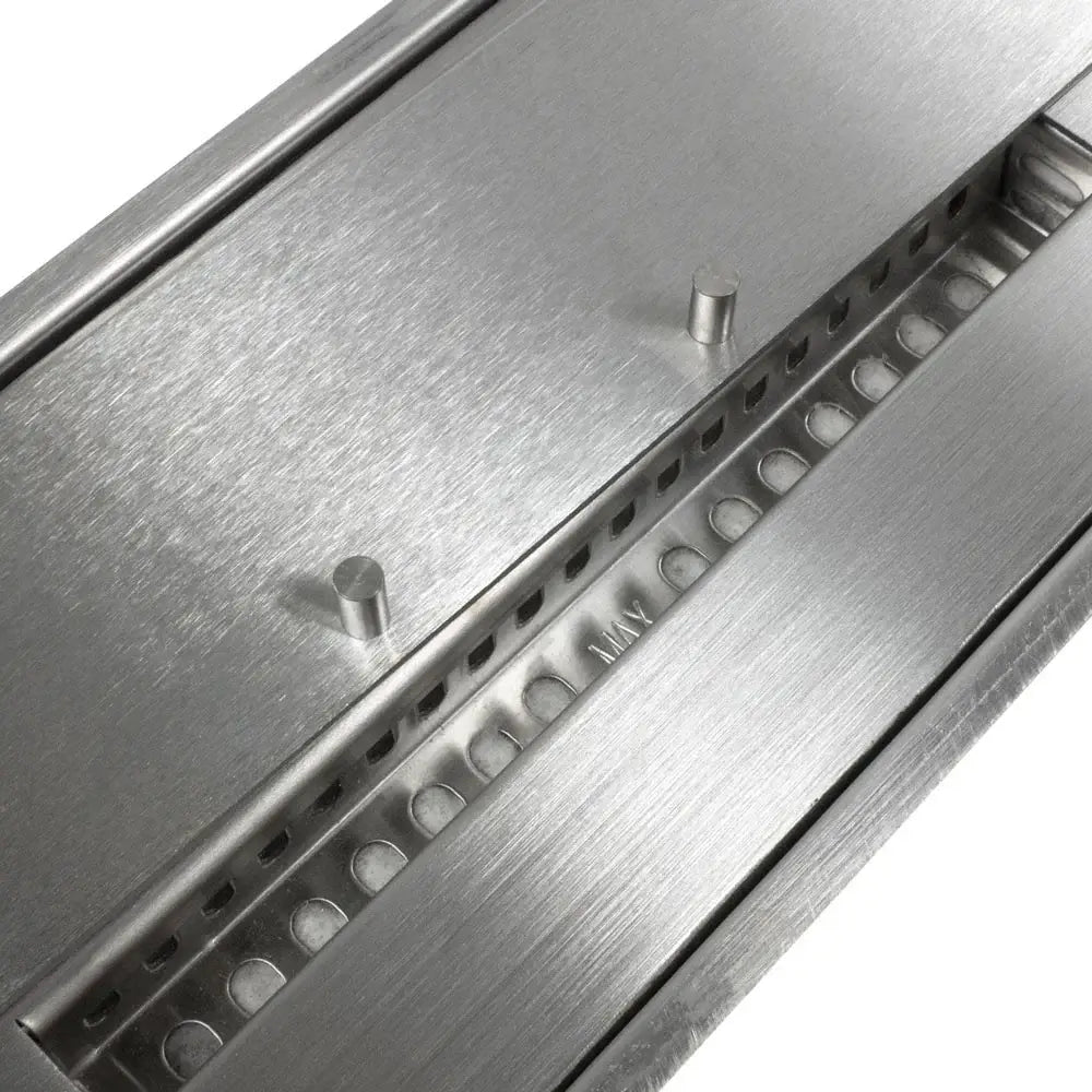 Close-up of the sleek stainless steel design of the Deluxe Bio Burner, showcasing its fuel channel.