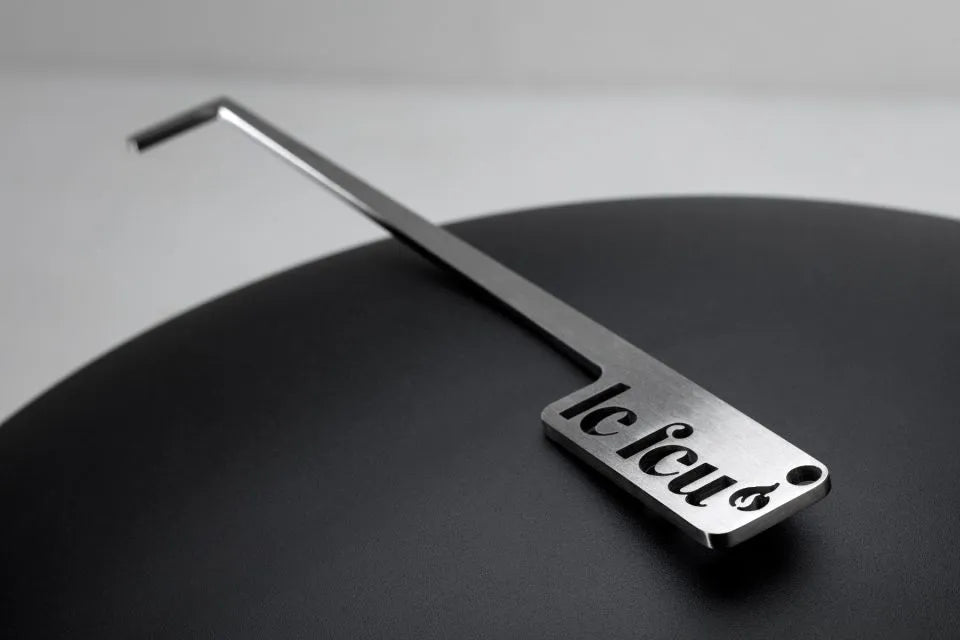 Stainless steel handle designed for Le Feu bioethanol fireplaces, featuring a sleek and modern design.