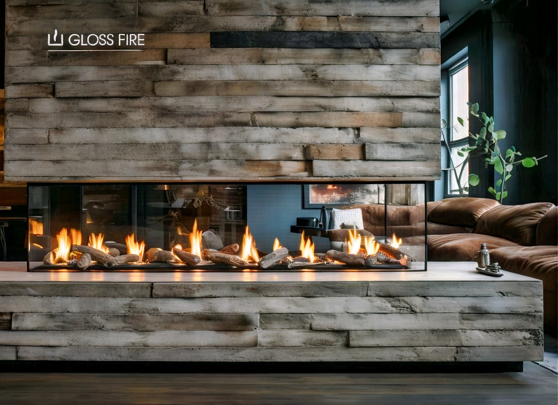 Modern indoor fireplace with flames and decorative stones, featuring a sleek design and glass enclosure.