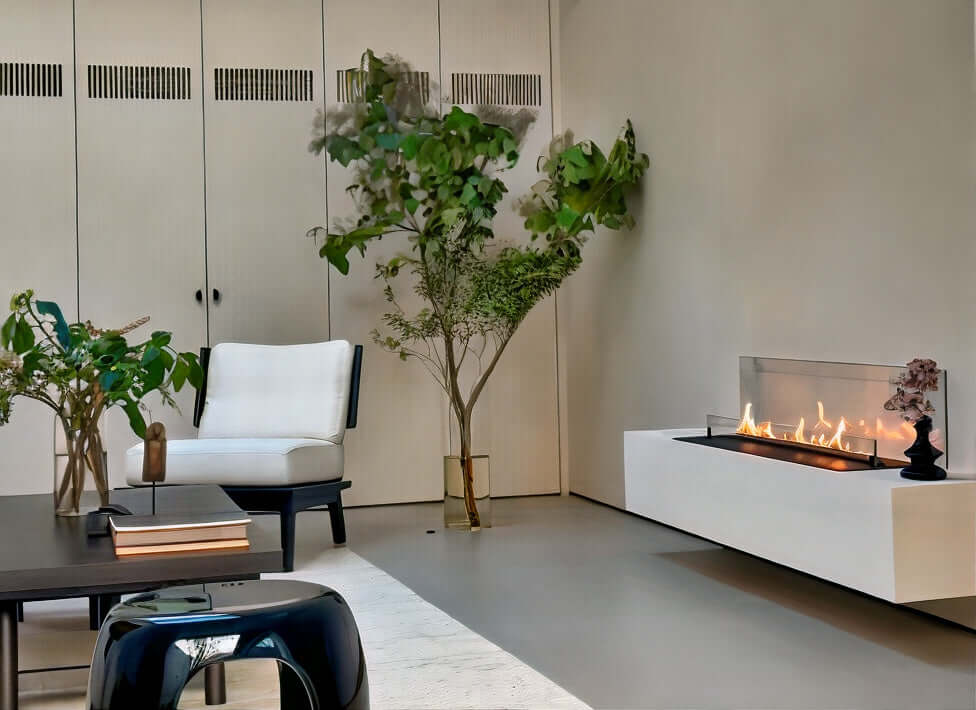 Modern living room featuring DALEX Touch 1000 bioethanol fireplace with flames, sleek design, and natural decor.