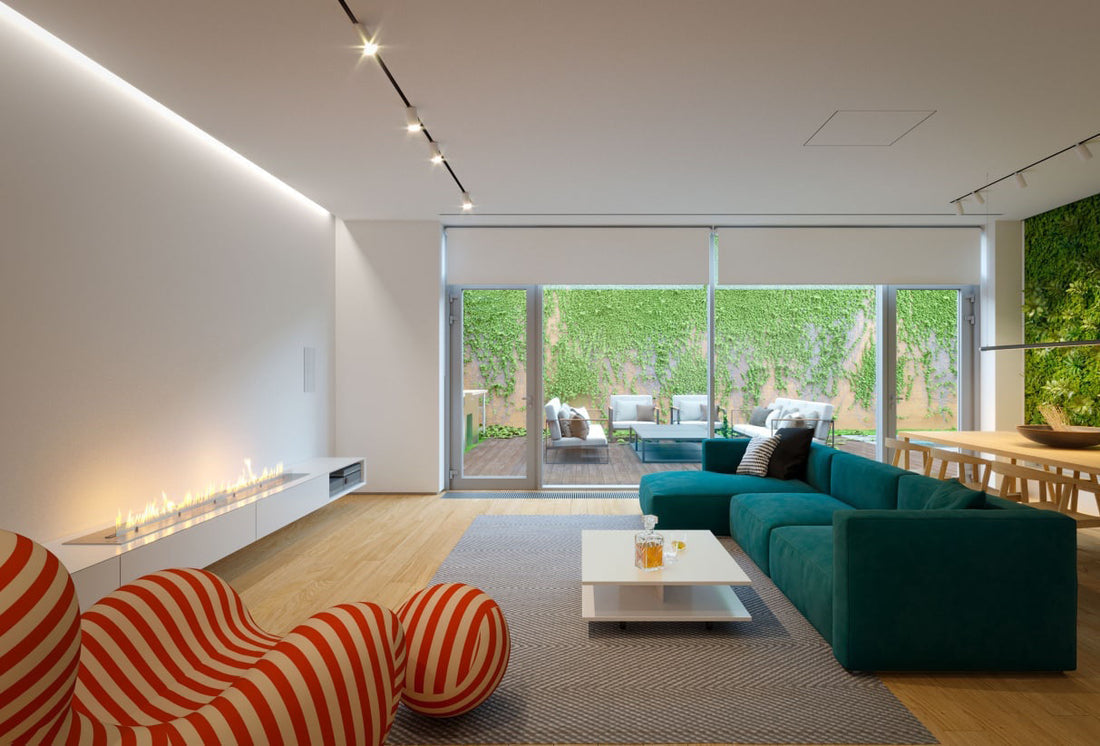Modern living room featuring an automatic bioethanol fireplace and stylish furniture with a view of a lush outdoor space.