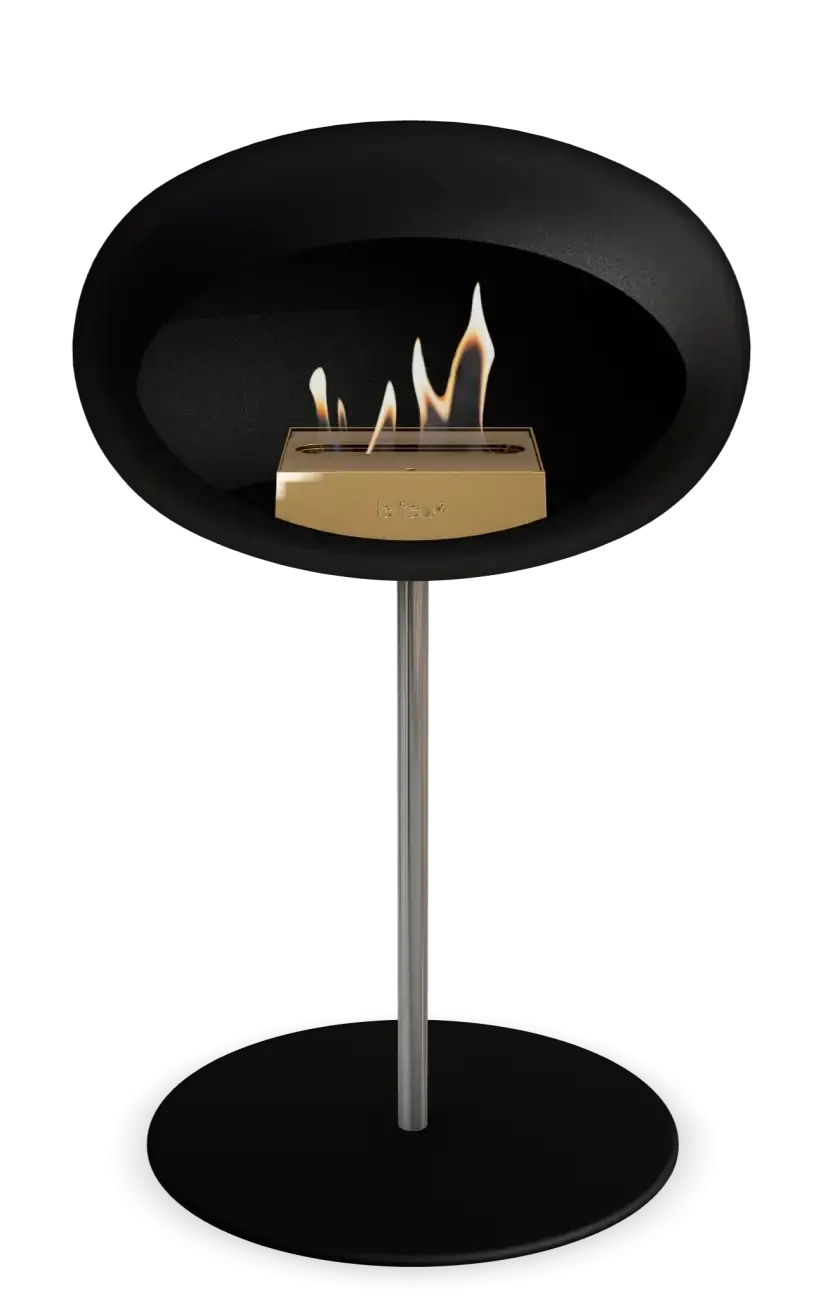 Le Feu Dome ground low steel bioethanol fireplace in black, modern design with flames, perfect for indoor and outdoor spaces.