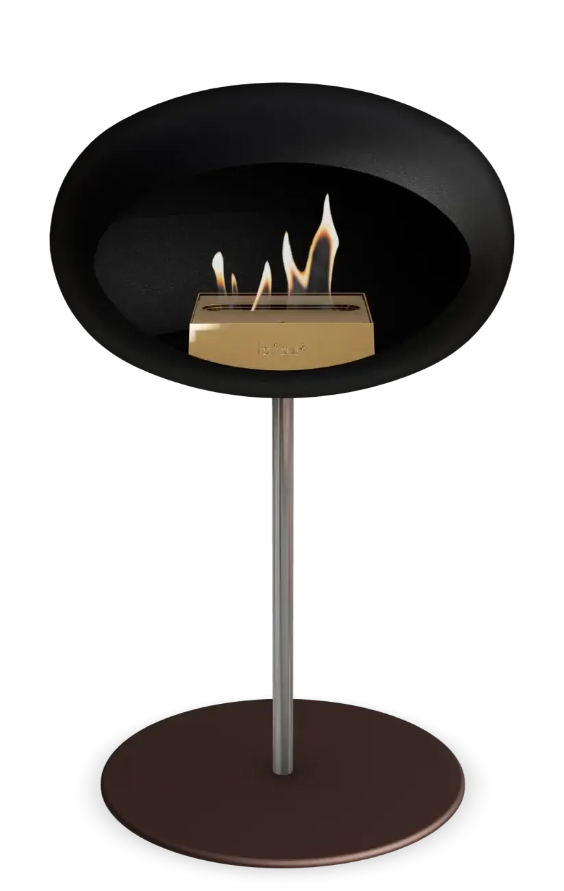 Freestanding bioethanol fireplace Le Feu Dome in black, featuring a sleek design and portable heating solution.