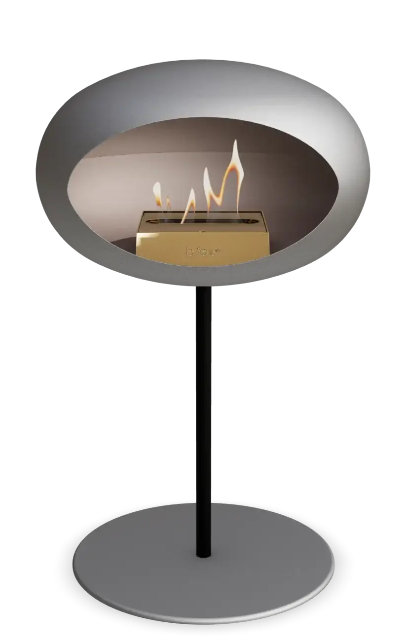Freestanding Le Feu bioethanol fireplace with stylish steel design and flames visible, ideal for indoor and outdoor living.