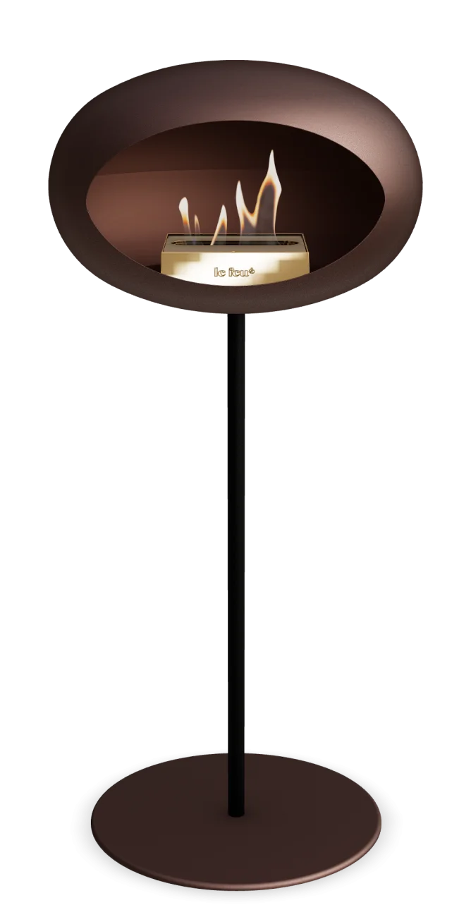 Freestanding Le Feu Dome bioethanol fireplace in Mocca finish, showcasing modern design and eco-friendly warmth.