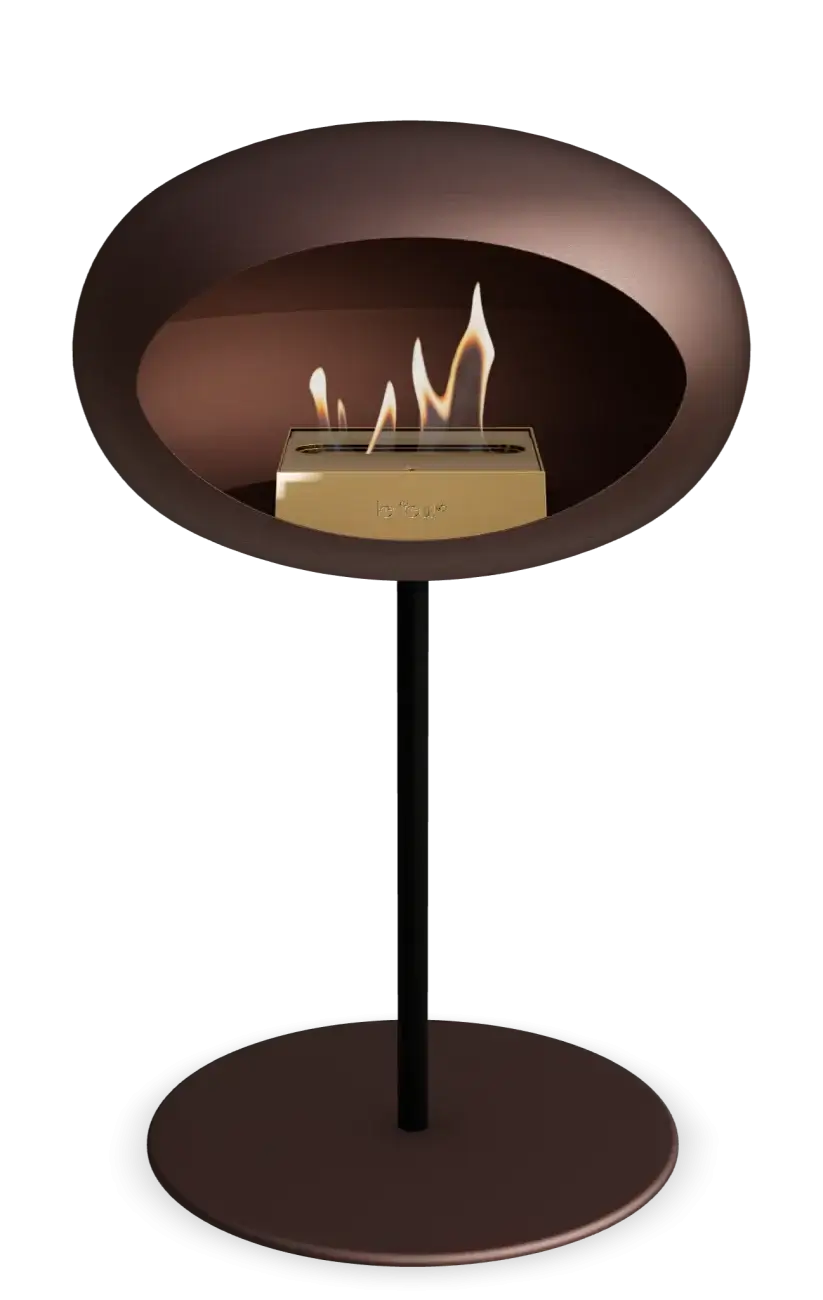 Freestanding Mocca bioethanol fireplace with smooth design and visible flames for indoor and outdoor spaces.