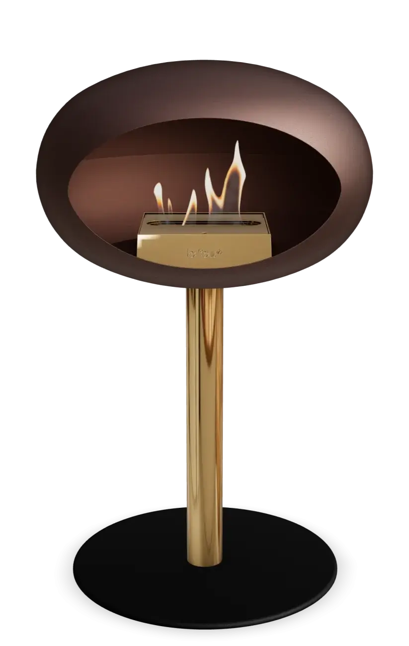 Freestanding mocca bioethanol fireplace by Le Feu with a gold base and stylish dome design for indoor and outdoor use.