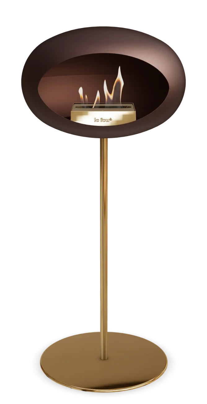 Freestanding Le Feu Dome high steel bioethanol fireplace in mocca finish with flames.