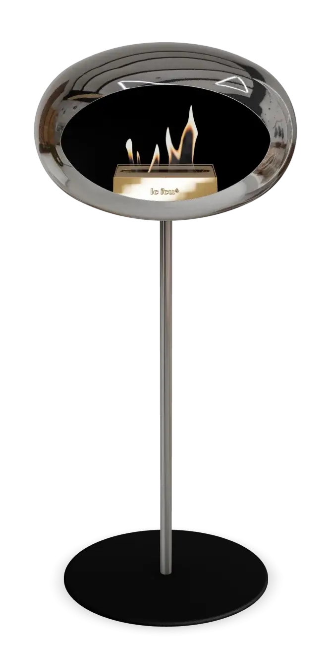 Freestanding bioethanol fireplace Le Feu Dome in chromed silver, designed for elegance and warmth in modern interiors.