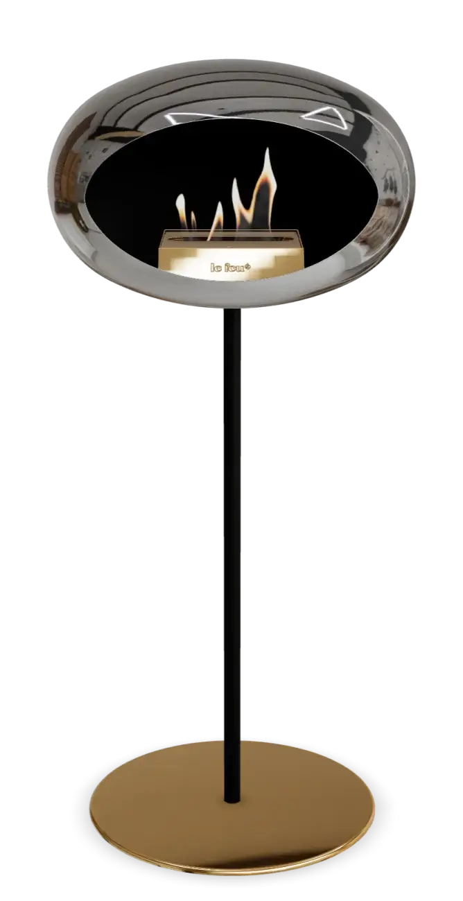 Freestanding bioethanol fireplace Le Feu Dome in chrome and gold, offering modern elegance and eco-friendly warmth.
