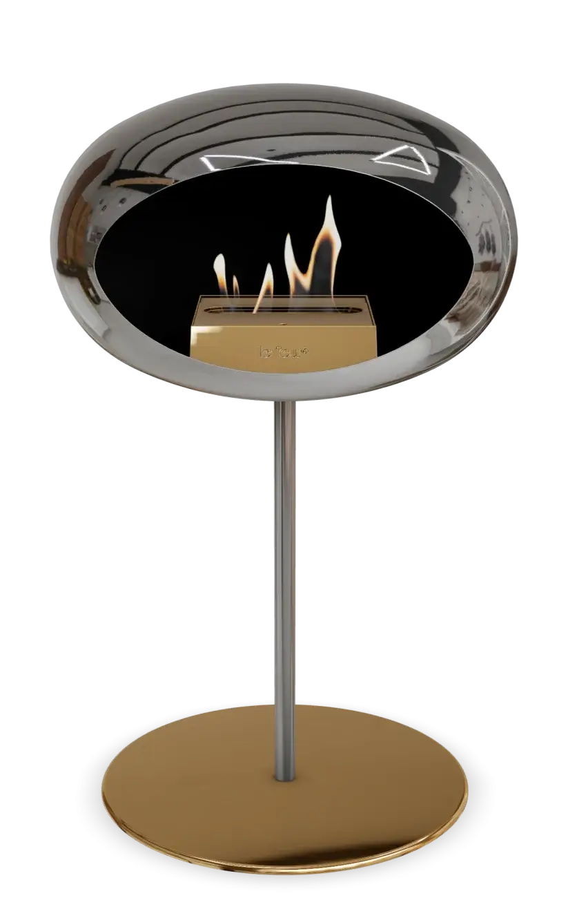 Le Feu Dome Ground Low Steel bioethanol fireplace in chromed silver, elegant design with visible flames.