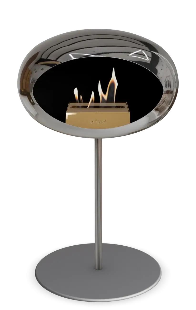 Le Feu Dome Ground Low Steel bioethanol fireplace in chromed silver, offering eco-friendly warmth and stylish design.