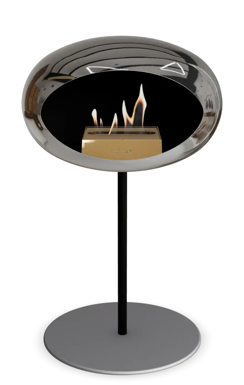Freestanding Le Feu Dome Ground Low Steel Bioethanol Fireplace in chromed silver finish.