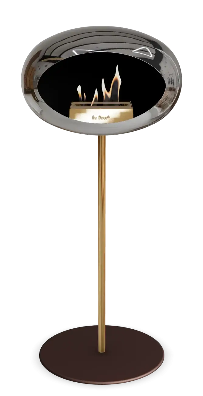 Freestanding Le Feu Dome Ground High Steel bioethanol fireplace in chromed silver design with modern aesthetics.