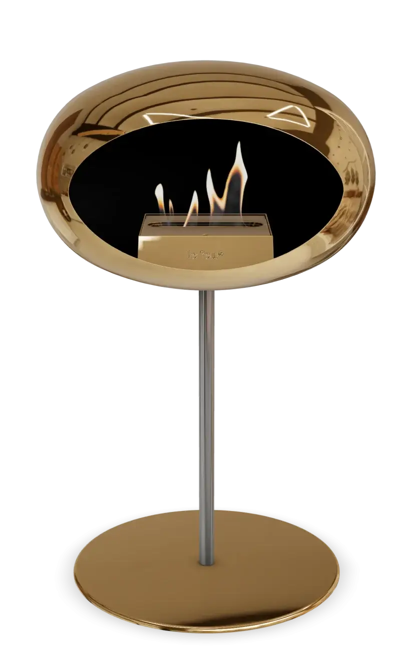 Stylish freestanding bioethanol fireplace in chromed rose gold for contemporary living spaces.