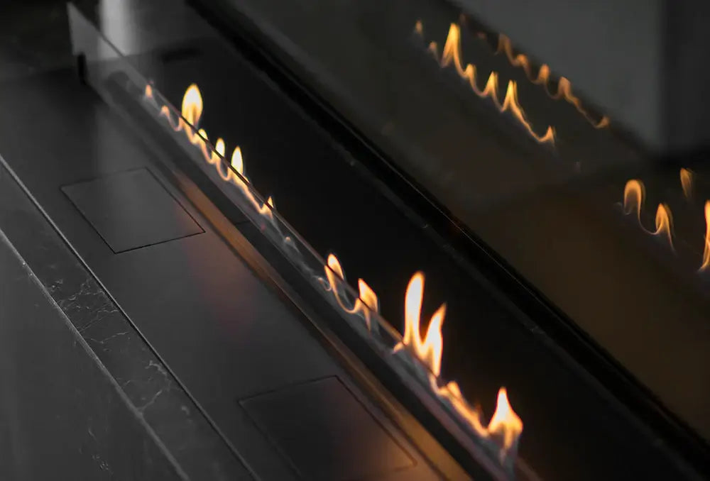 Close-up of the sleek flame display in the DALEX Touch 1000 automatic bioethanol fireplace.
