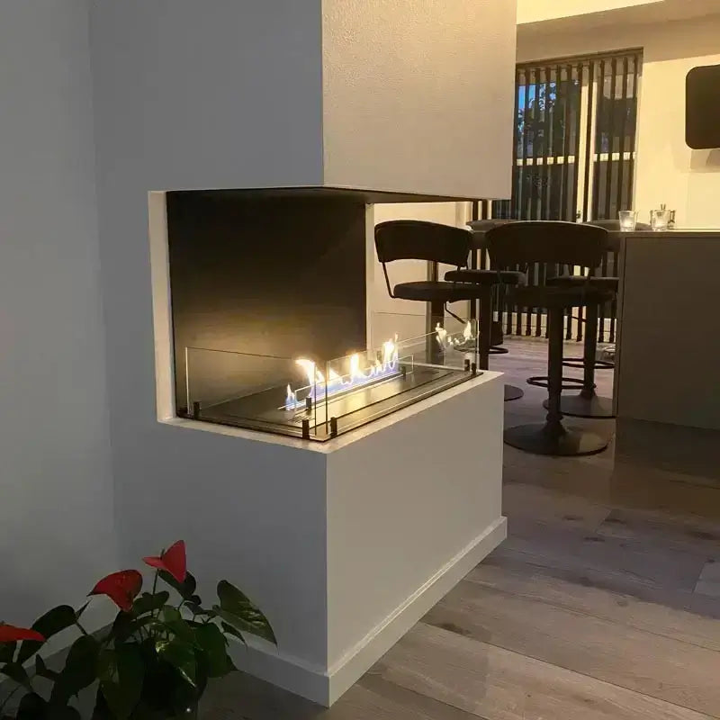 Modern built-in bioethanol fireplace with sleek design and safety glass, enhancing interior ambiance and warmth.