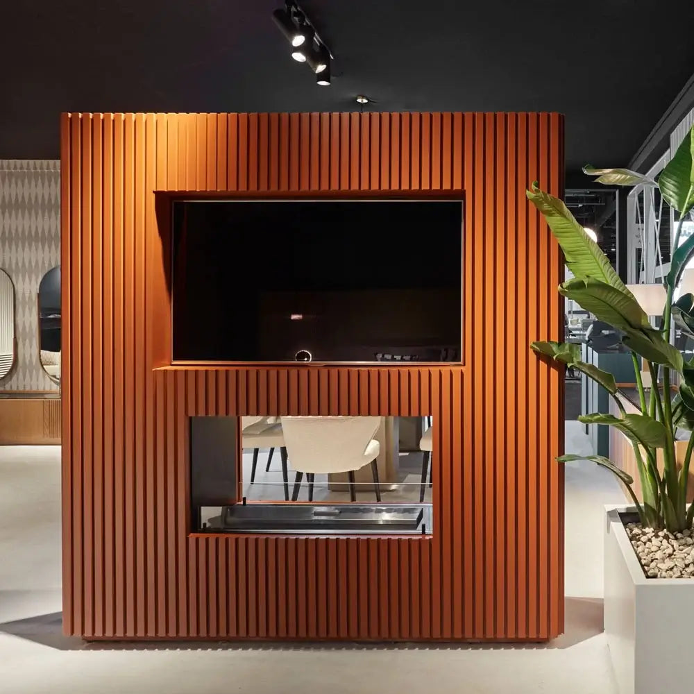 Modern living room featuring a built-in bioethanol fireplace with vertical wooden slats and elegant decor.