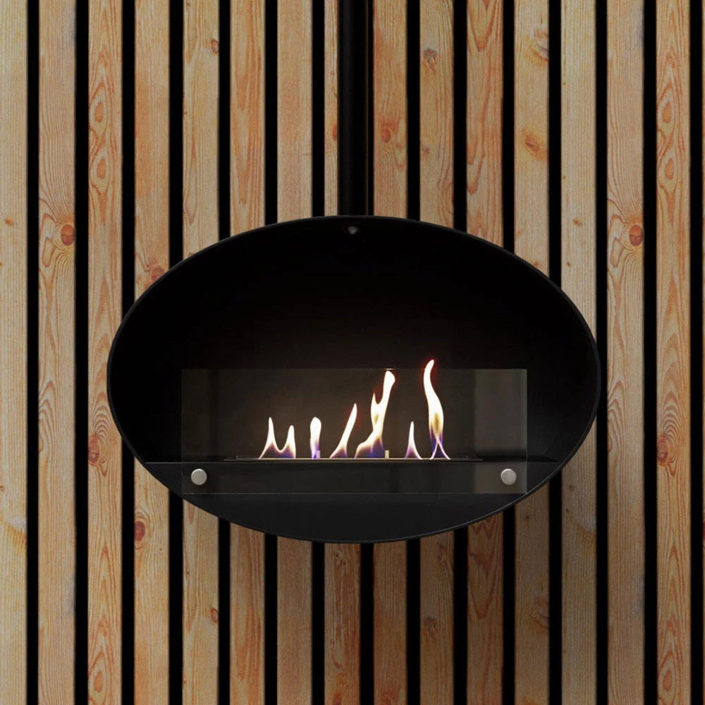 Halifax Black 60 cm hanging bioethanol fireplace with flames, set against a wooden background.