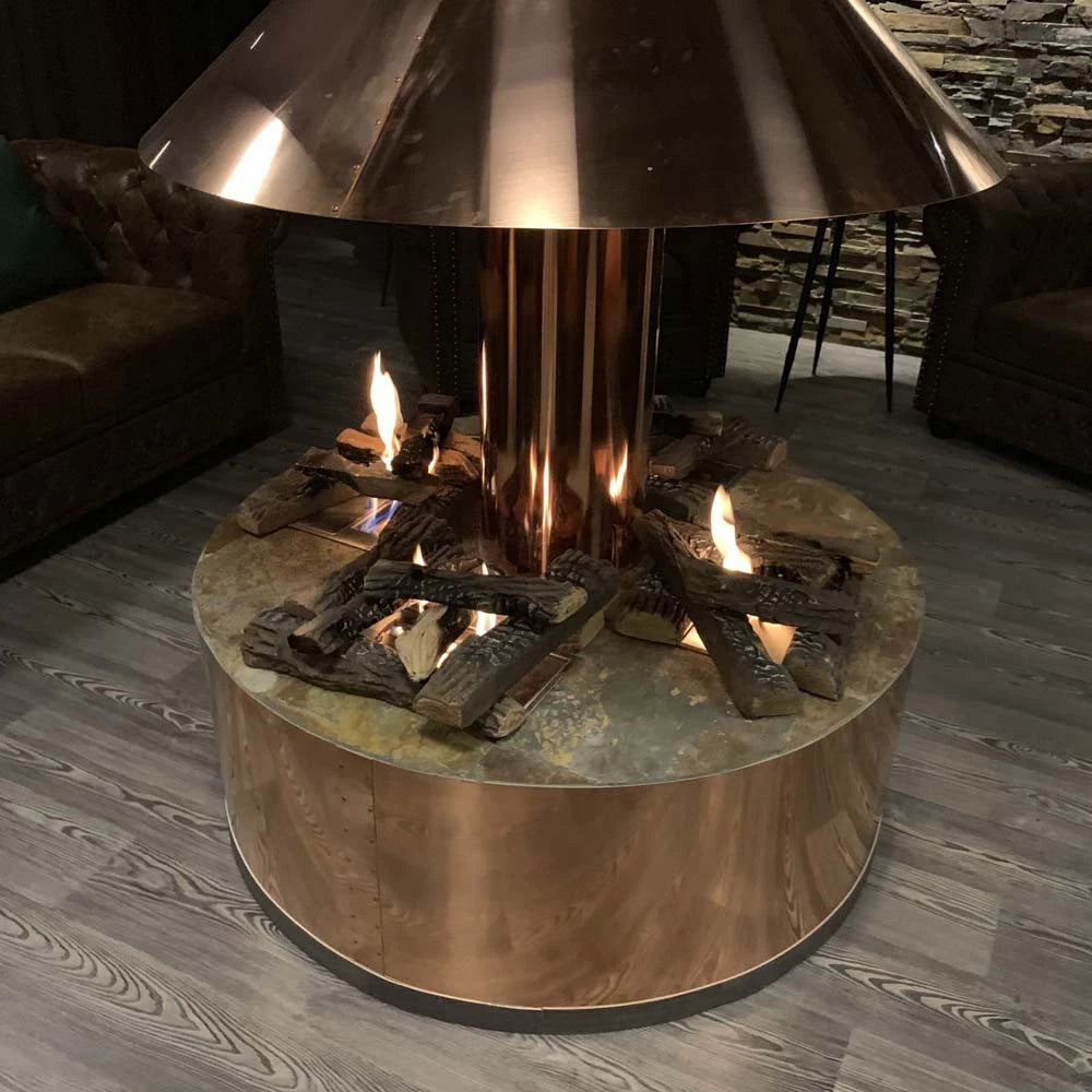 Decorative bio fireplace with ceramics wood logs and flames, showcasing a stylish copper design and modern living space.