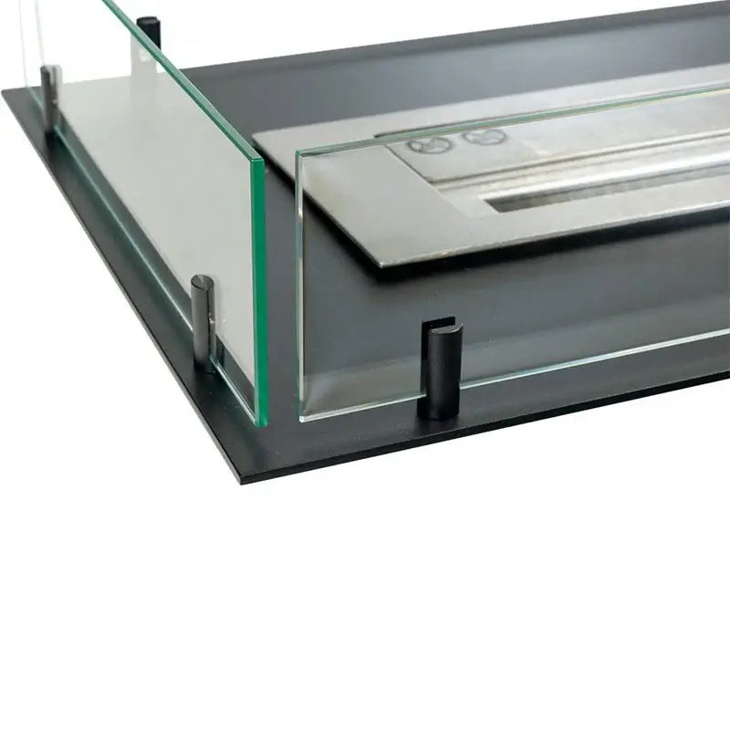 Close-up of the Fireplace Foco Room Divider 1000 showcasing the sleek glass and steel design with a bioethanol burner.
