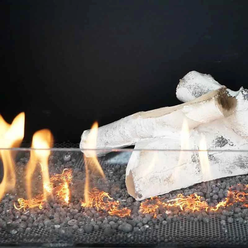 Glow Flame fiber in a bio fireplace, showcasing flames and decorative log for an eco-friendly ambiance.