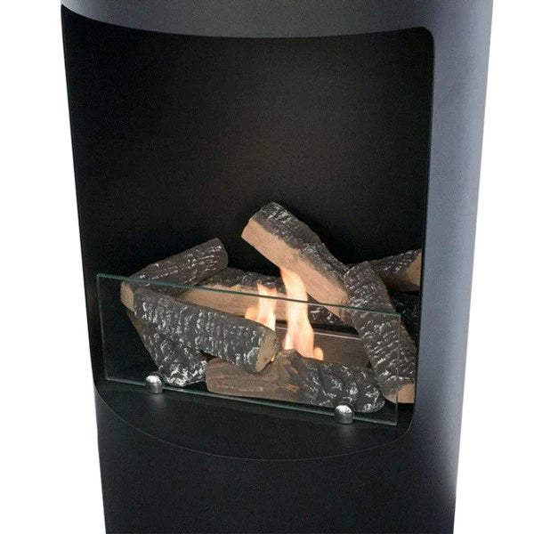 Ceramic wood logs in a bio fireplace, displaying flames and decorative logs for enhanced ambiance.