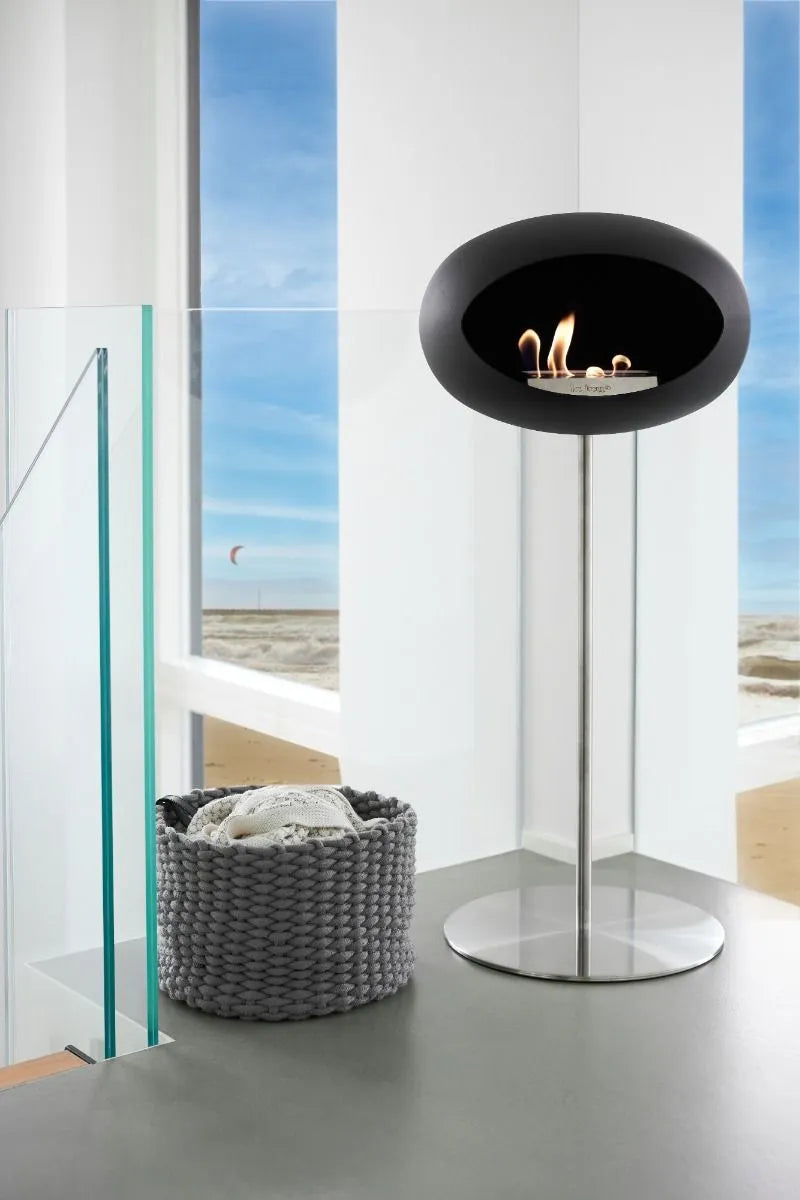 Freestanding black bioethanol fireplace by Le Feu with modern design in stylish living space.