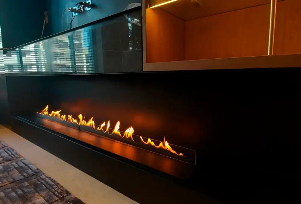 Elegant automatic bioethanol fireplace DALEX Touch 1000 showcasing a vibrant linear flame for modern interiors.
