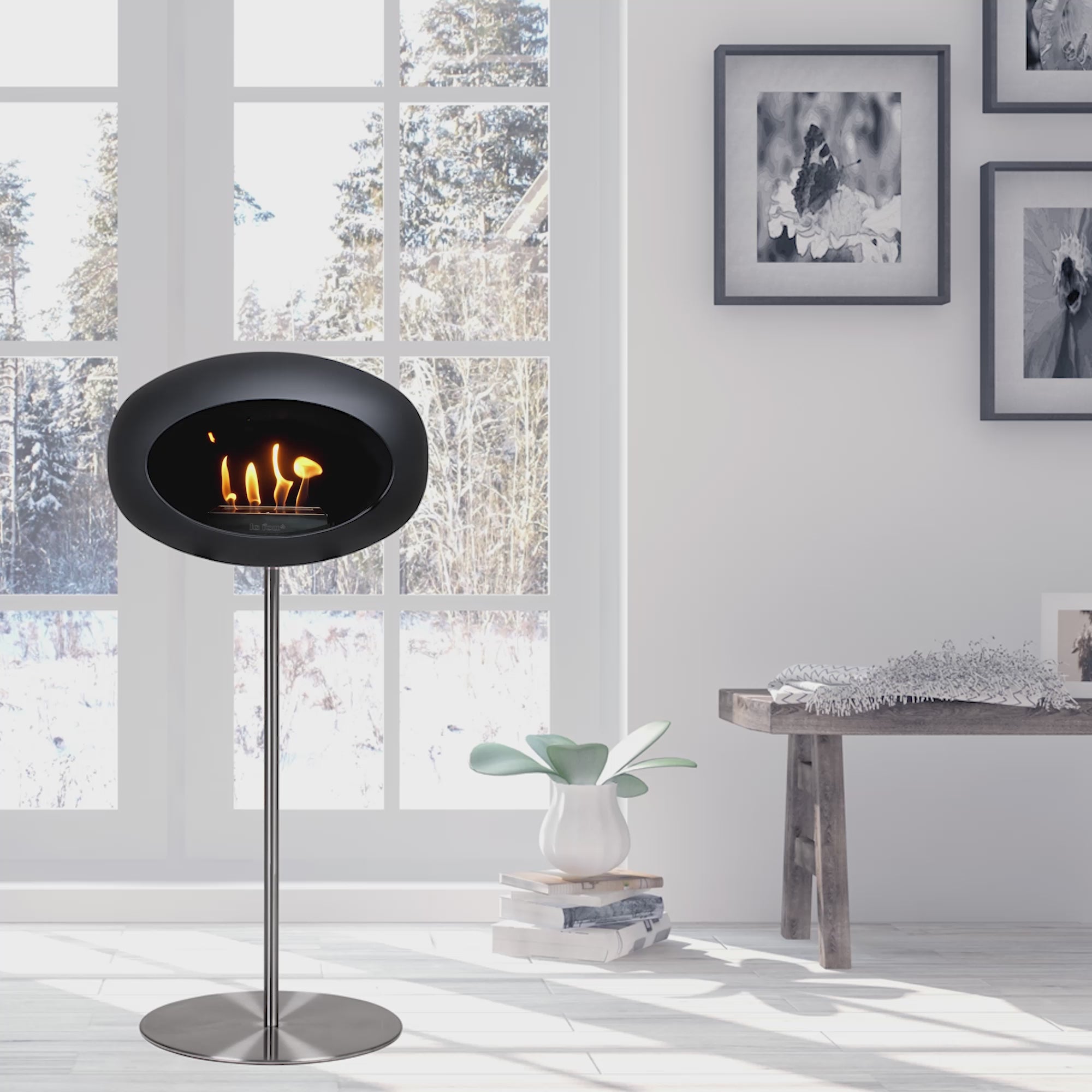 Freestanding Le Feu Dome Ground High Steel bioethanol fireplace in modern room, providing warmth and ambiance.