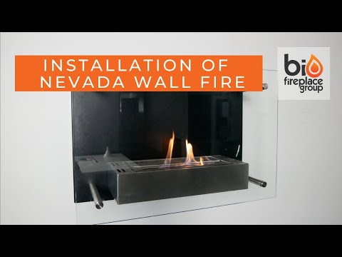 Installation process of Nevada Wall Mounted Bioethanol Fireplace, showcasing flames and modern design.