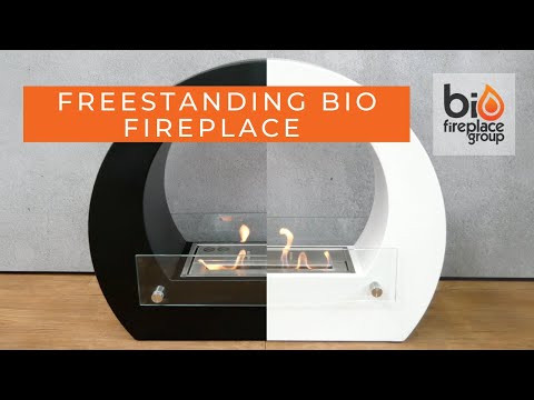 Freestanding bio fireplace with a stylish black and white design, featuring a clear glass flame enclosure.