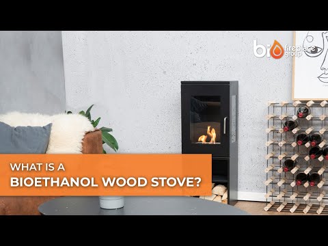 Montgomery Black bioethanol wood stove in stylish living room with wine rack and cozy sofa.