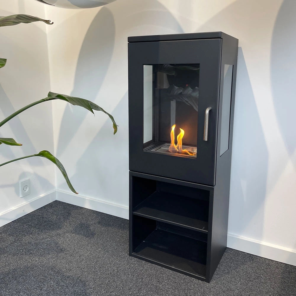 Cheyenne bioethanol stove fireplace in square design, freestanding with glass sides and visible flames.