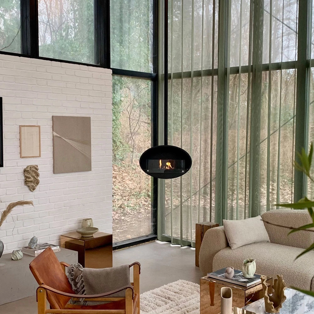 Stylish Halifax Black hanging bioethanol fireplace in a modern living room setting.