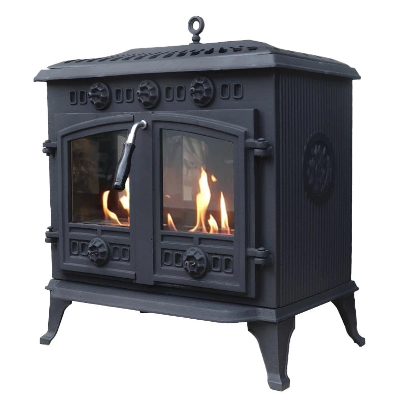 ScandiFlames Spitsbergen cast iron bioethanol stove with flames visible through the glass doors.