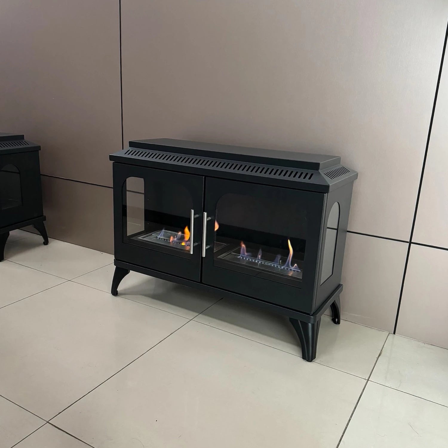 Atlanta Double bioethanol stove with double doors, featuring a modern design and visible flames.