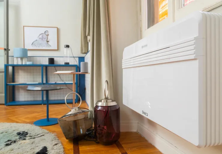 Through-the-wall air conditioners with heat pump