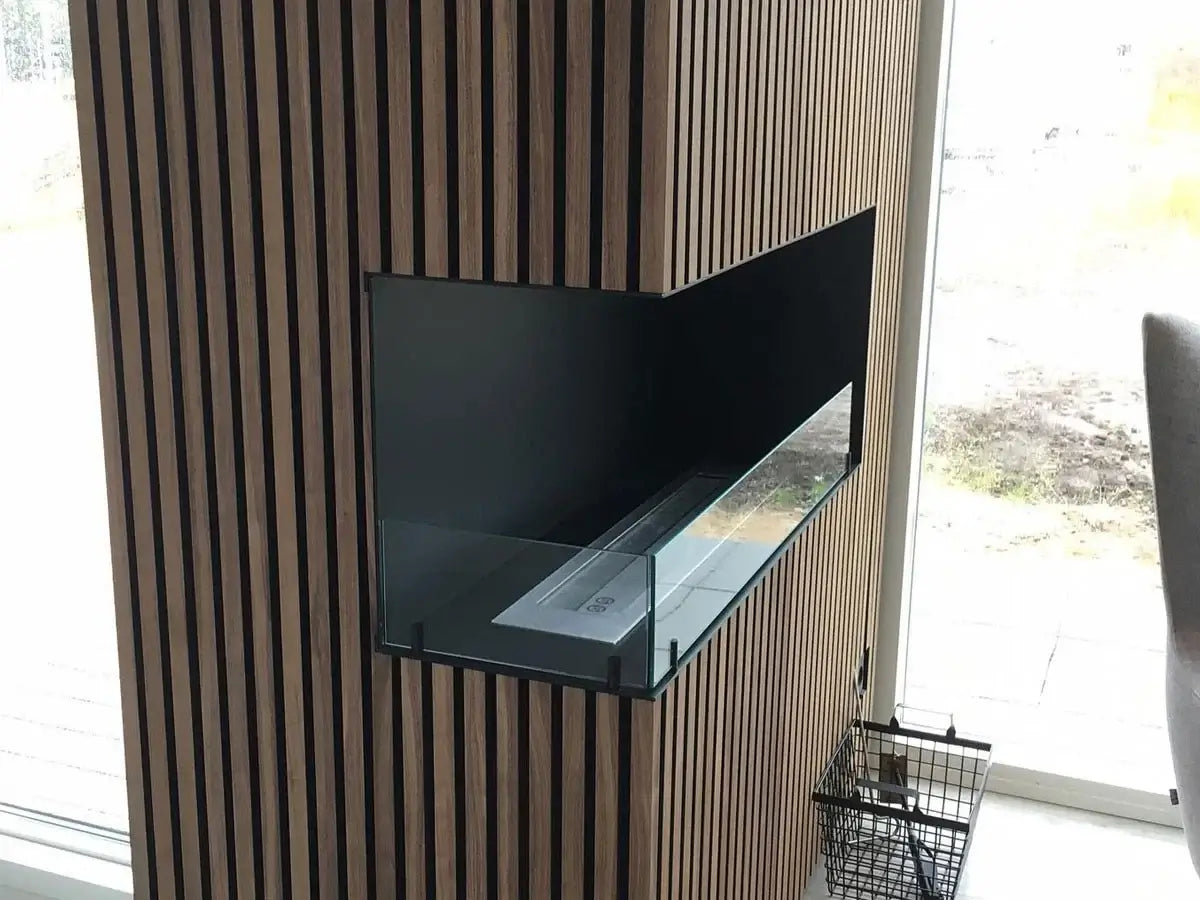 Modern built-in bioethanol fireplace with glass front and wooden accent wall design.