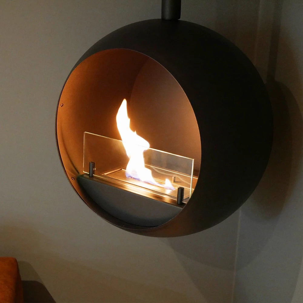 Edmonton suspended bioethanol fireplace showcasing flames in a stylish round design, perfect for modern interiors.
