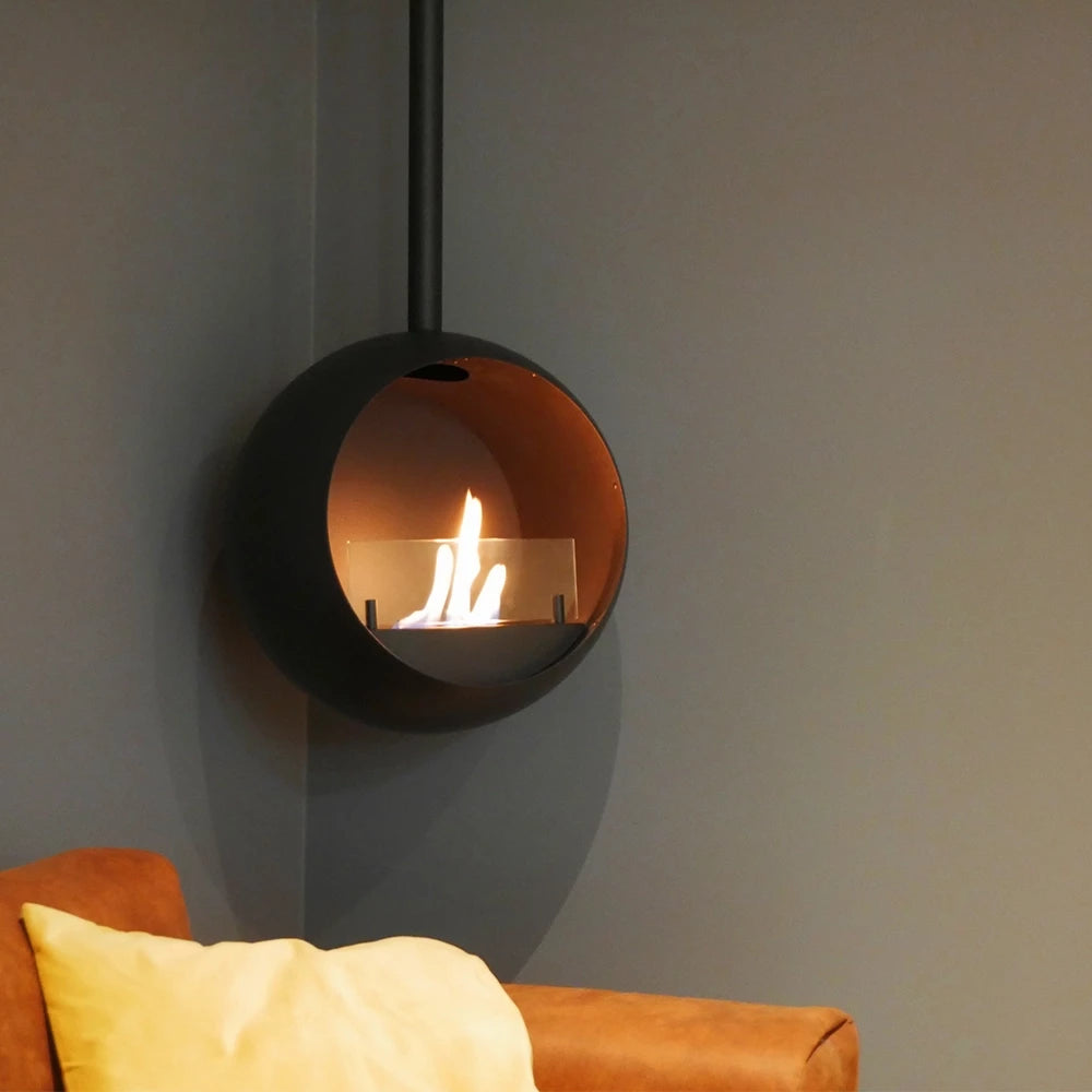 Edmonton round suspended bioethanol fireplace showcasing flames, perfect for modern living room décor.