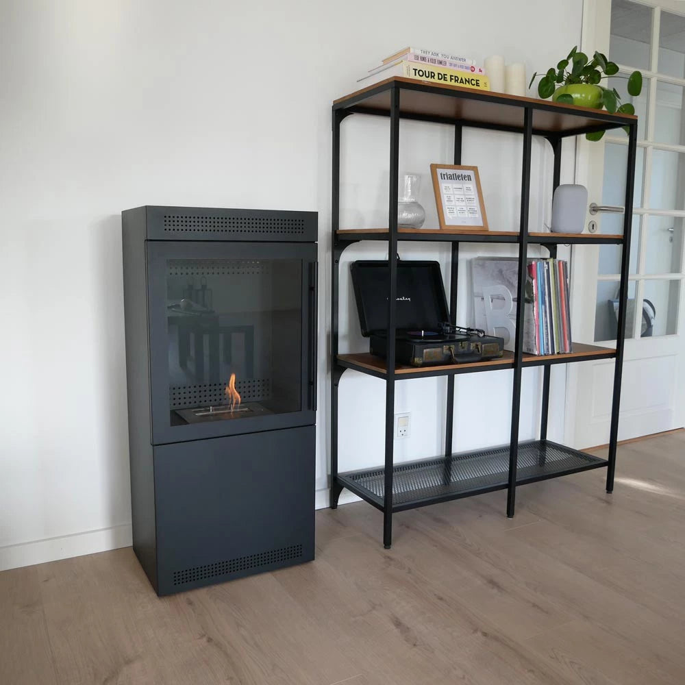 Jackson bioethanol stove beside a stylish bookshelf in a modern living space.