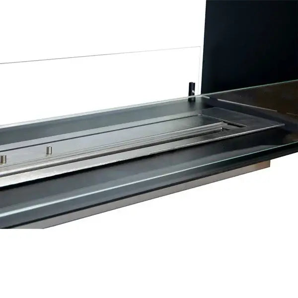 Close-up of Fireplace Foco Two 1200 stainless steel bioethanol burner with tempered glass panel.