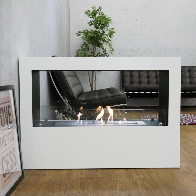 Lansing white freestanding bioethanol fireplace viewable from two sides, acting as a stylish room divider.